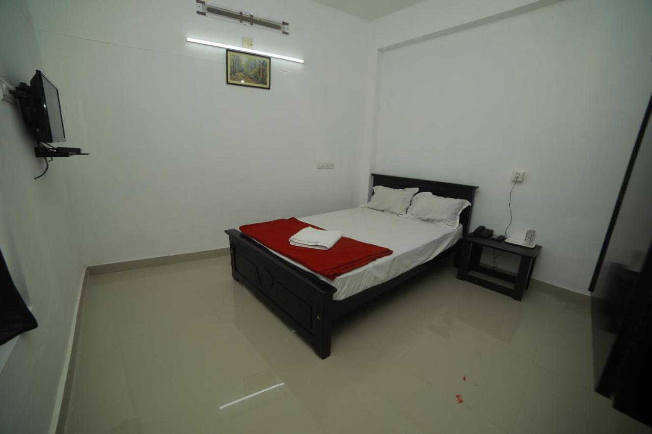 Meghna Residency Otel Thiruvananthapuram Dış mekan fotoğraf