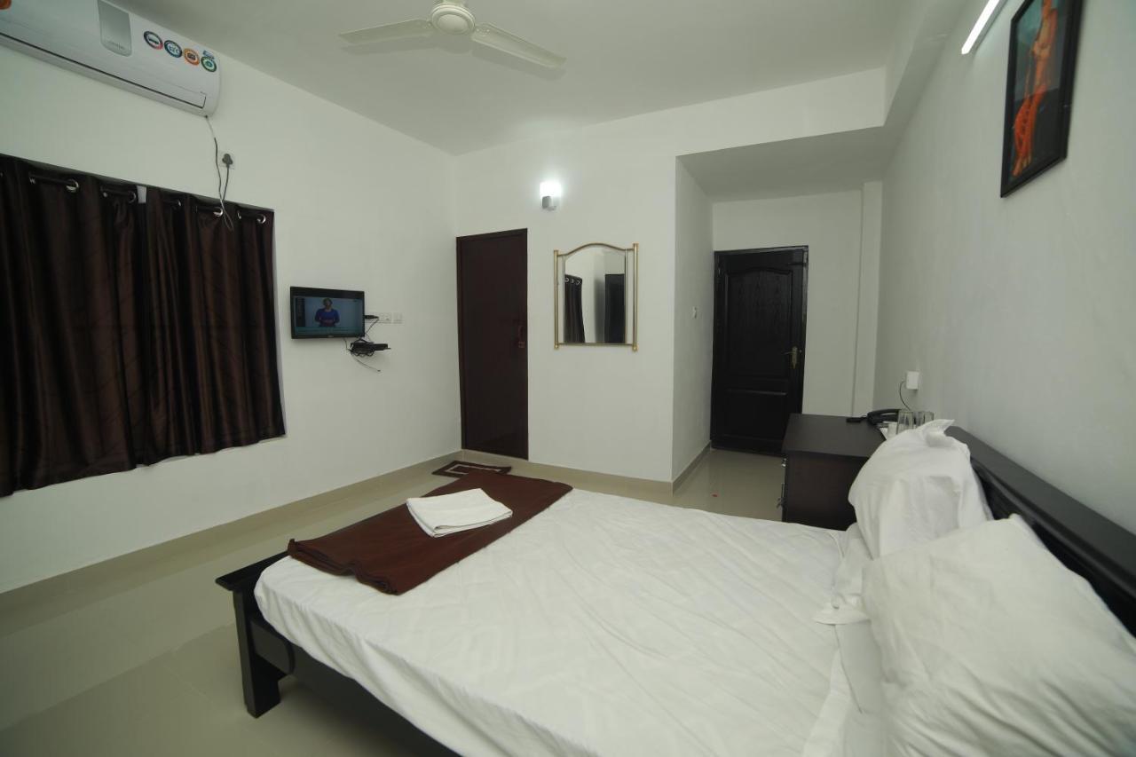 Meghna Residency Otel Thiruvananthapuram Dış mekan fotoğraf